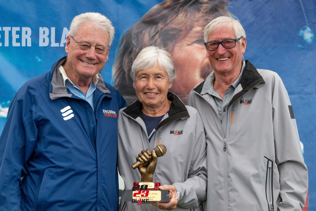 John and Linda Parrish with the Peter Montgomery Trophy, alongside Peter (PJ) Montgomery